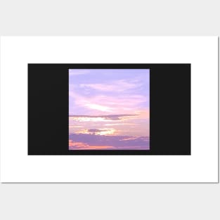 Cloudy pink sunset sky Posters and Art